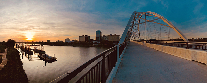 Panoramic view of downtown Little Rock, Arkansas with the newly completed Broadway Bridge in the foreground.