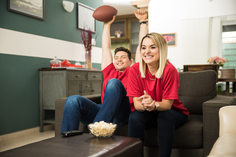 Couple Celebrating A Touchdown