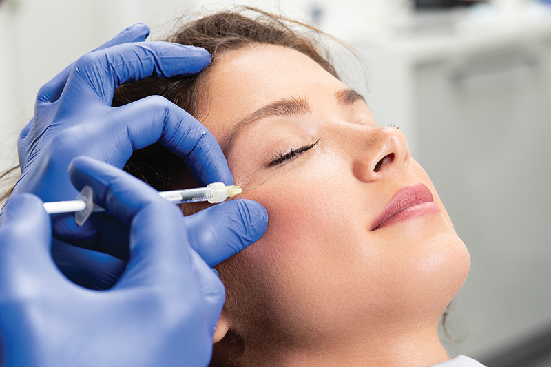 Attractive Young Woman Is Getting A Rejuvenating Facial Injection
