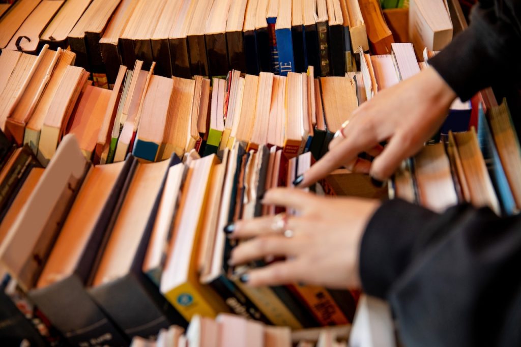 Young Man Receiving A Gift From His Father.