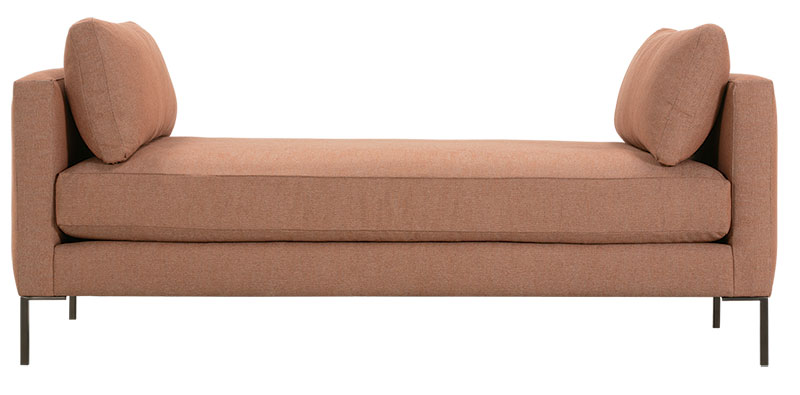 Light orange-brown settee couch with two pillows (one on each end)