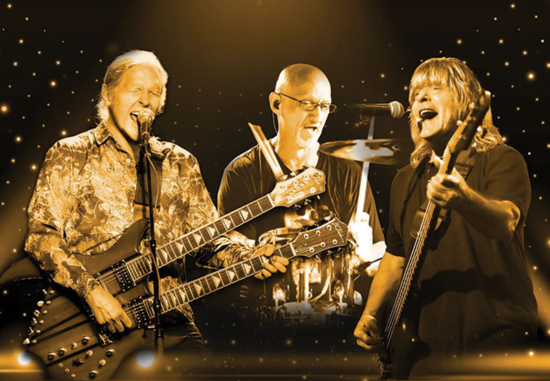 Band Zebra on stage, playing instruments