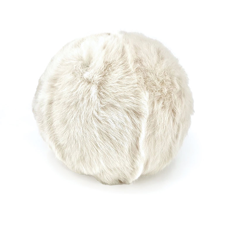 Bring visual pizzazz to your collection of square throws with a ball-shaped Toscana shearling pillow in plush ivory. 13″l x 13″w. JADE, 324 Metairie Rd., 504-875-4420, jadenola.com. 