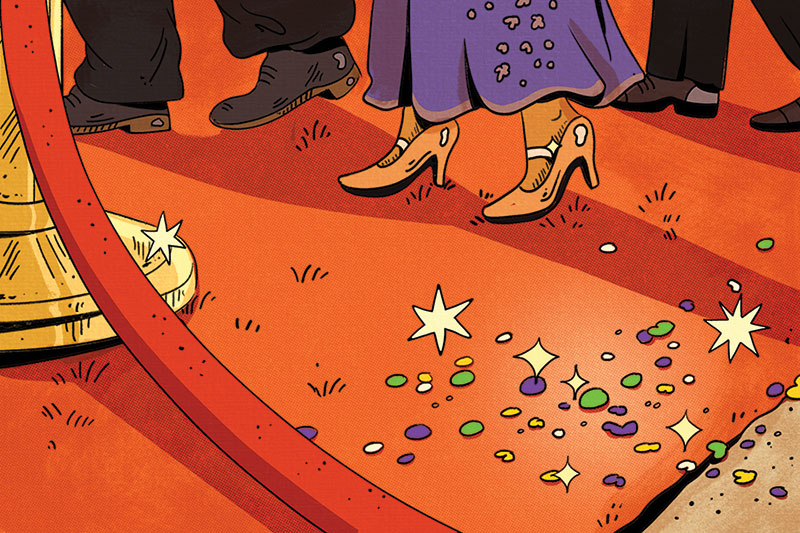 Illustration of a close up of the red carpet, focusing on the shoes of celebrities. On the carpet edge near the red velvet rope is Mardi Gras-colored confetti